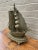 An unusual and beautifully detailed mid-20th century German brass sailing ship nightlight that effortlessly bridges...