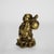 An antique cast brass figurine depicting the revered Laughing Buddha, known as Hotei, dating to approximately C. 1900....