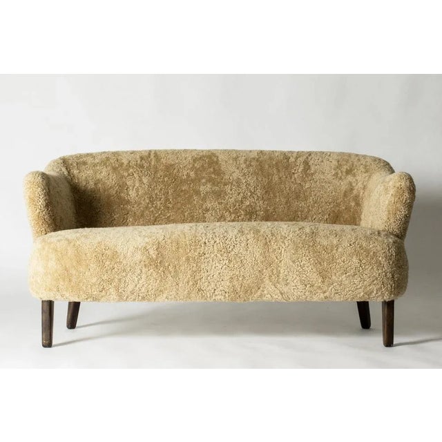 Beautiful “Ingeborg” sofa by Flemming Lassen, with curvesome forms. Designed in 1940 and named after his mother, the...