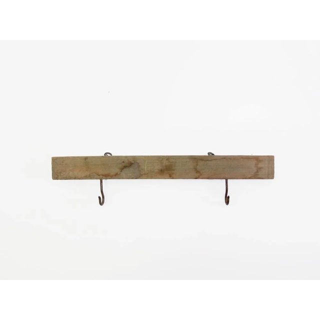 Vintage metal hook rack or sign holder with simple wood backboard and beautifully aged green undertones. The rectangular...