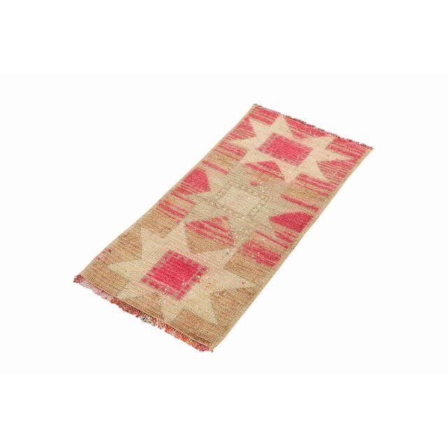 Vintage Handknotted decorative mini rug from Kars region of Turkey. Approximately 45-55 years old. In very good condition.