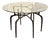 Sculptural Antique Bronzed Iron Legs Round 48” Glass Top Cyrano Dining Table by Made Goods For Sale