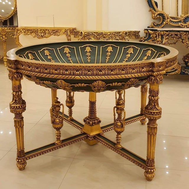 Transform your grand foyer, luxury residence, or formal living space with this breathtaking Louis XVI style center table....