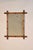 Circa 1900 faux bamboo mirror from France made from cherry. The frame is stunning on this hand turned cherry mirror. It...