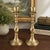 Elevate your décor with this elegant pair of vintage 13-inch solid brass candlesticks. Featuring beautifully twisted...
