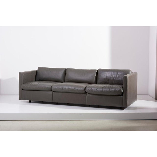 A original three-seat leather sofa design in 1971 by Charles Pfister for Knoll. Original grey color Knoll leather. Overall...