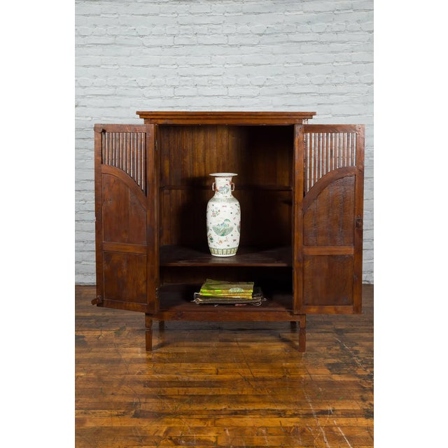 Javanese Antique Teak Armoire with Slatted Motifs, Tapered Feet and