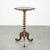 This graceful antique tall oak plant/side table features beautiful, warm colors and is richly finished with fine wood...