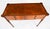This is an elegant English burr walnut console table dating from the 1950's. This magnificent piece is crafted from...