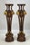 A grand pair of Neoclassical pedestals in the Empire taste. These impressive 4-foot columns feature a rich mahogany-toned...