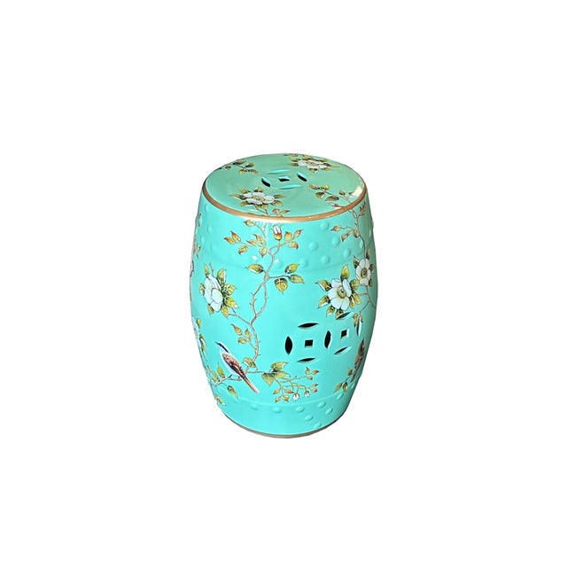 This exquisite vintage-style ceramic garden stool showcases a vibrant turquoise glaze, beautifully hand-painted with a...