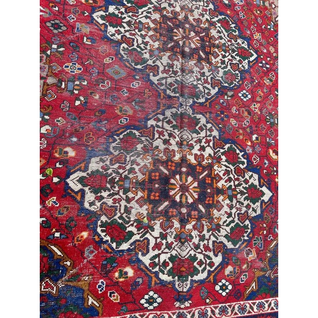 Nice mid century Bakhtiar rug with beautiful floral and stylized designs and nice colours with a red background and blue,...