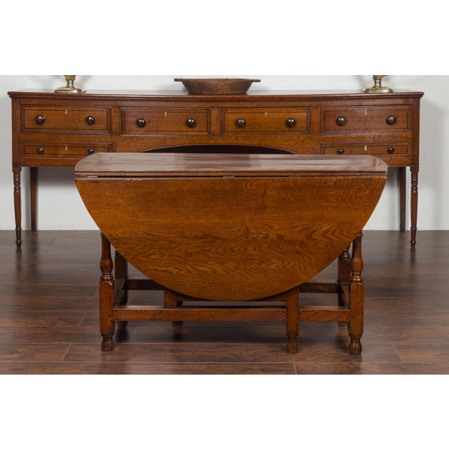 Late 19th Century English Oval Oak Drop-Leaf Table with Single Drawer and Baluster Legs For Sale - Image 5 of 11