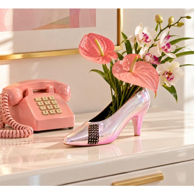 A vintage metallic pink ceramic vase, in the form of a high heel shoe. Good vintage condition, minor surface imperfections.