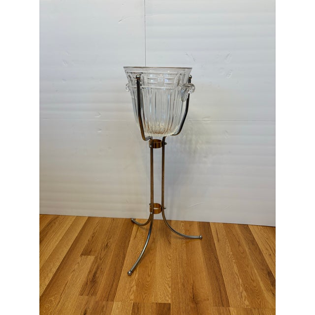Bring elegant Hollywood Regency style to your next gathering with this striking free-standing champagne chiller. It...