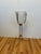 Bring elegant Hollywood Regency style to your next gathering with this striking free-standing champagne chiller. It...
