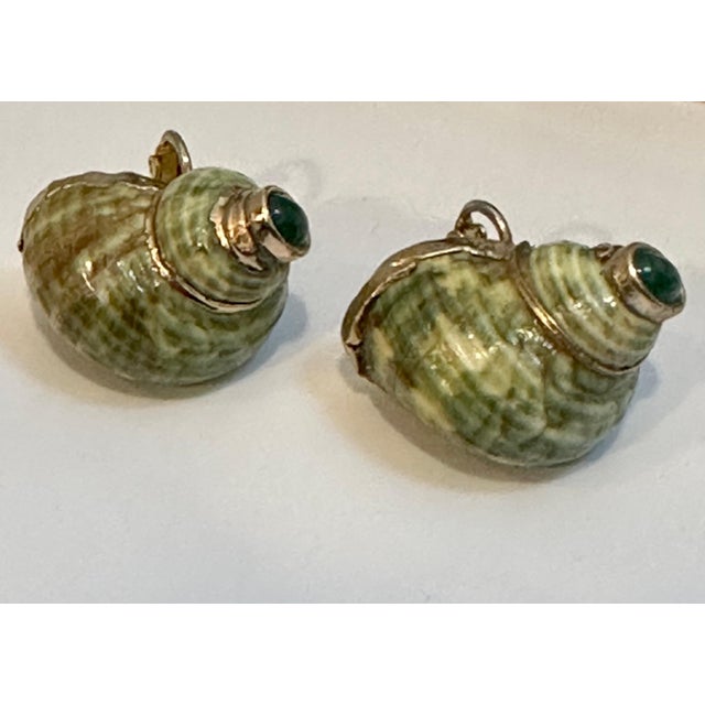 Vintage Turbo Shell Emerald Cabochon Gold Earring Mother of Pearl clip on earring This exquisite pair of earrings are...