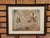 A charming, original print from 1988 depicting an expressive and nostalgic circus scene featuring two clowns on a balance...