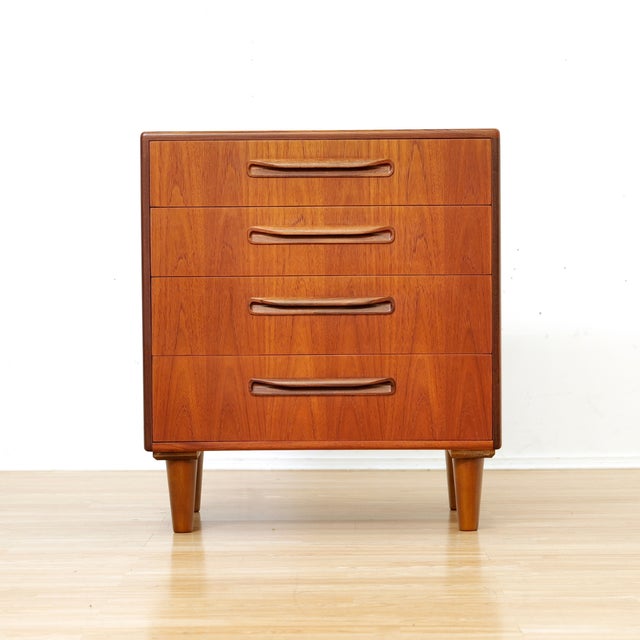 This mid-century dresser nightstand was produced by G Plan during the 1960s. Made from rich teak wood this vintage bedside...