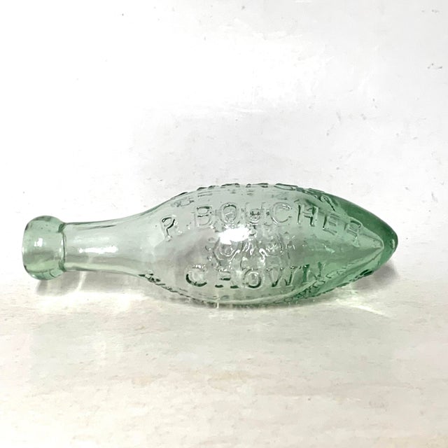 This listing is for a late 19th-century aqua glass mineral water bottle made for R. Boucher Mineral Water Works of...