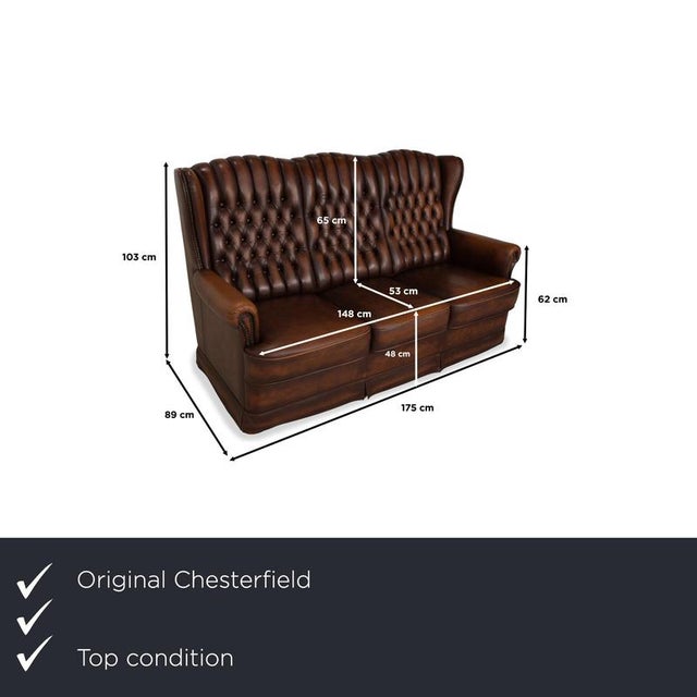 The Chesterfield three-seater sofa boasts an extremely unique design. Featuring rusty brown leather, padded backrests, and...