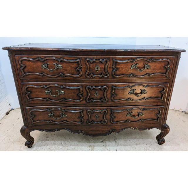John Richards dresser from the "European Crossroads Collection". High quality 3 drawer Dresser made of solid wood and...