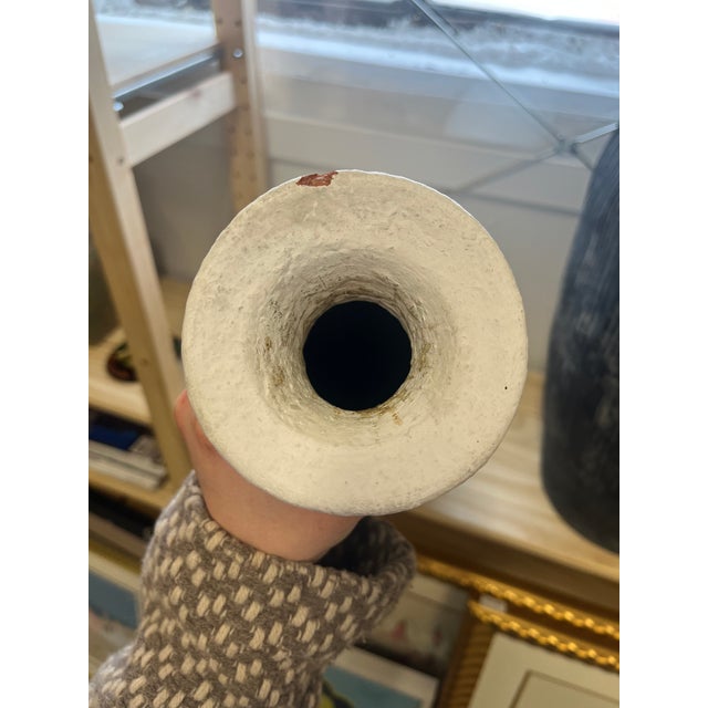 Incredible curves on this gorgeous floor vase in white painted terracotta. Stands an impressive 24" tall and 10" Wide at...