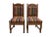 A pair of vintage carved wood Boho, Southwest-style side chairs. Features hand-carved frames with pierced detail at the...