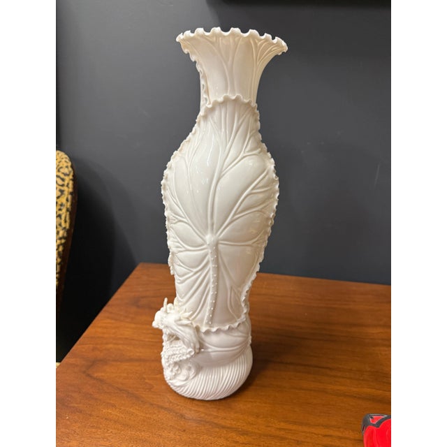 Chinese Porcelain Dragon Vases with storage cases. They feature lotus leaves and dragons. They are in excellent condition...