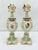 A rare and exceptionally elaborate pair of Meissen porcelain ewers, dating to the mid-19th century, executed in a richly...