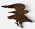 Mid-19th-century eagles like this almost never surface intact. Hand-forged, copper-washed, and weathered to perfection, it...