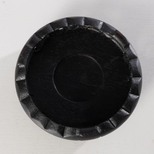 Asian porcelain bowl on stand. Fine detail on flowers and leaves can be seen.