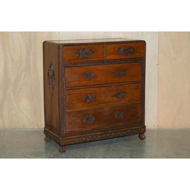 Absolutely stunning, ornately hand carved Chinese export circa 1890 chest of drawers in Camphor wood A very good looking...