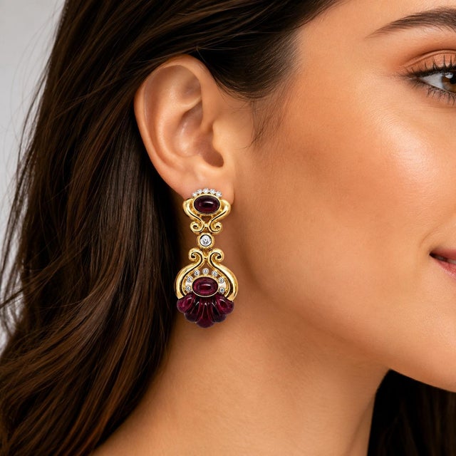 18k Yellow Gold Drop Earrings with Rhodolite Garnets and 0.52 carats of Round Diamonds. Total weight 29.64g.