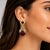 18k Yellow Gold Drop Earrings with Rhodolite Garnets and 0.52 carats of Round Diamonds. Total weight 29.64g.