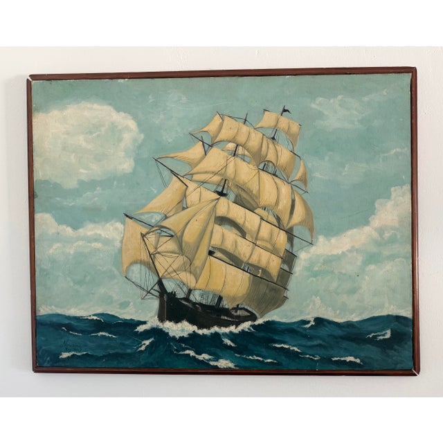 Mid-20th Century "Clipper Ship at Sea" painting on stretched canvas is in good vintage condition, complete with its...