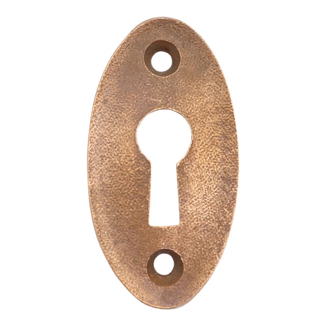 Vintage 2 In. Brass Textured Oval Keyhole Cover Plate For Sale