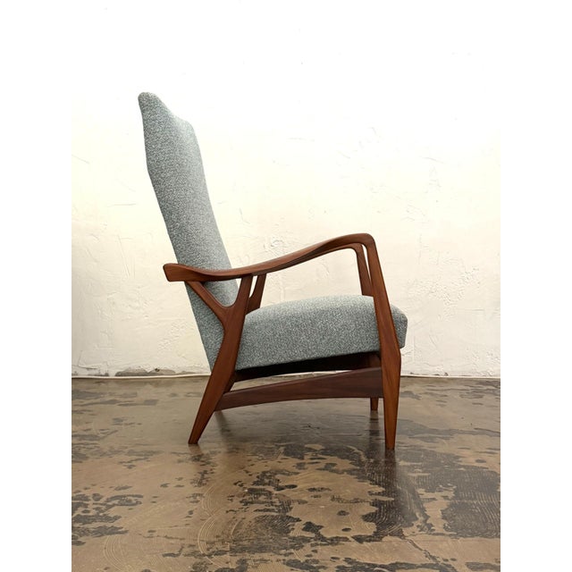 Danish Solid Teak Lounge Chair, 1960s An elegant Danish lounge chair from the 1960s, beautifully crafted from solid teak...