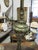 Pair of table lamps made from Baroque style altar candlesticks in silvered metal, with repousse scrollwork, turned...