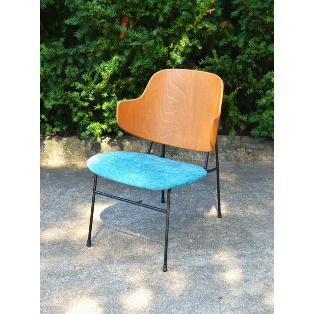 Vintage Danish Modern "Penguin Lounge Chair" designed by Ib Kofod-Larsen and manufactured by Selig, Made in Denmark. This...