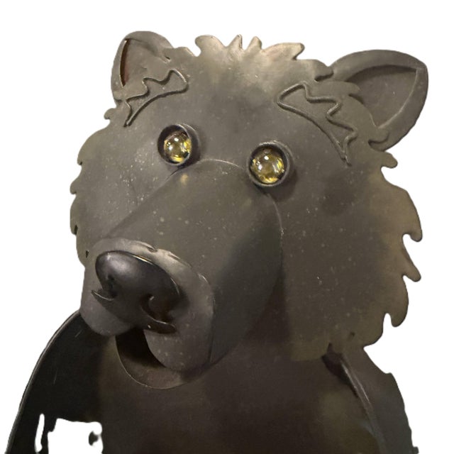 Bring a touch of shaggy, rustic charm to your home or garden with this impressive hand-forged metal bear sculpture....