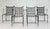 A striking set of four wrought iron dining armchairs originally designed by Mario Papperzini and produced in Italy for...