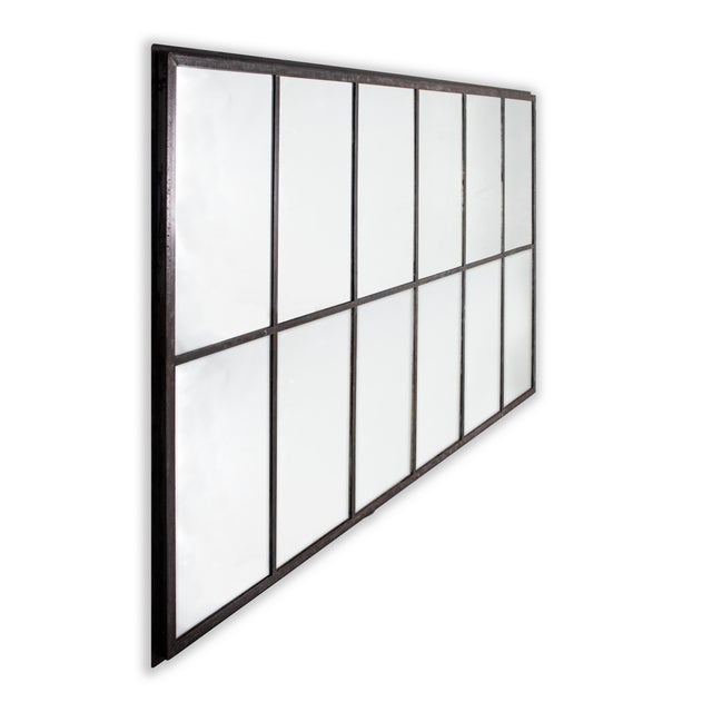Reclaimed Industrial window frame as mirror.