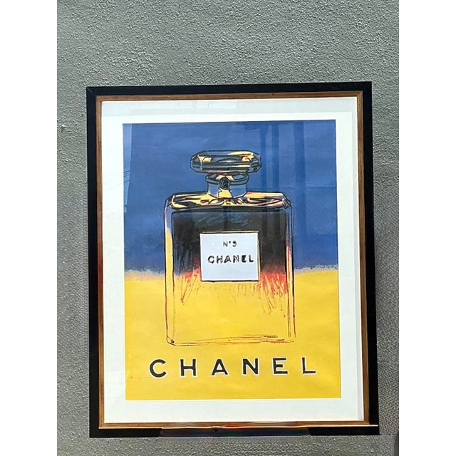 This striking framed advertising poster is a definitive celebration of the legendary collaboration between the House of...