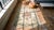 Early 20th Century 1930s Beige Floral Medallion Hank Knotted Pile Antique American Hooked Rug 3'0" X 5'1" Wool Carpet For Sale - Image 5 of 7