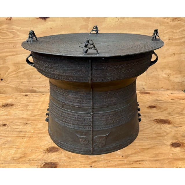 Make a bold statement with this vintage, larger-than-average bronze Asian rain drum table, a striking fusion of sculptural...