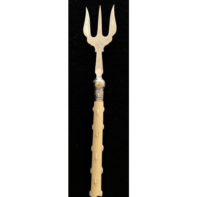 Antique British twig handle bread fork or serving fork! This serving fork has etched silver prongs, a detailed silver...