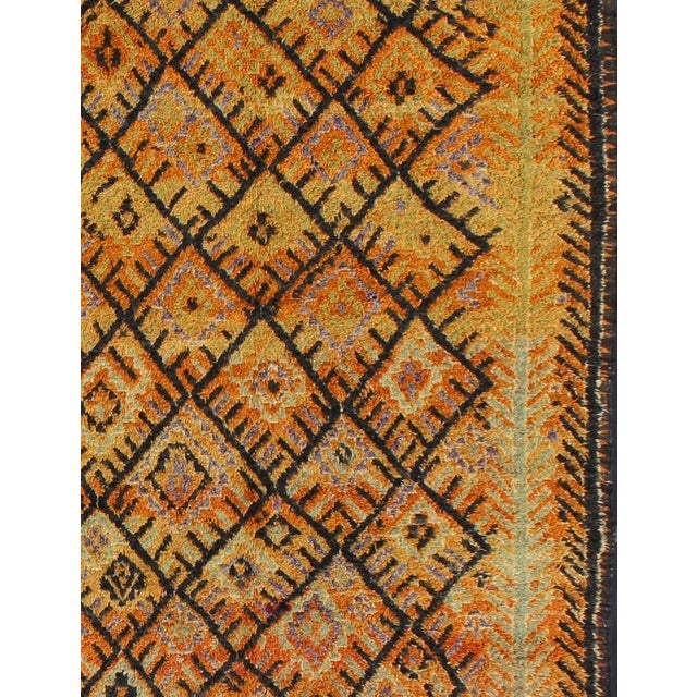 Measures: 6'6'' x 16'0''. This vintage Moroccan rug was woven by the Moroccan Berber tribes of Talsint. A lovely gallery...