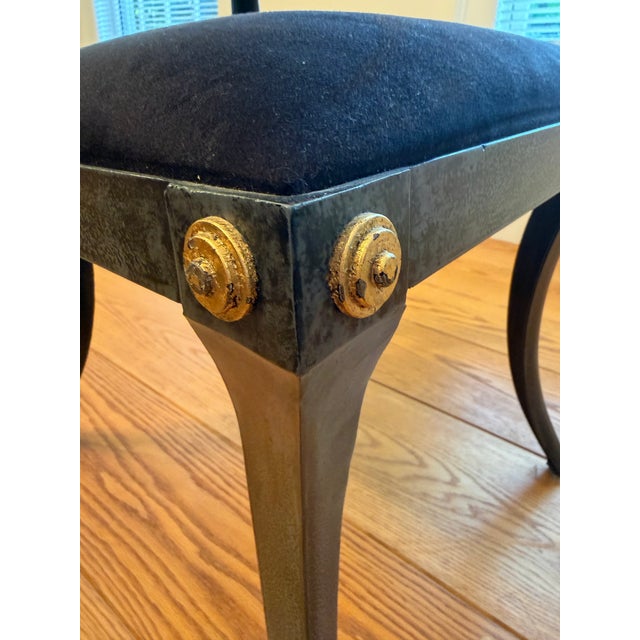 Striking and sophisticated, this set of six Klismos inspired side chairs brings an elevated, designer feel to any dining...