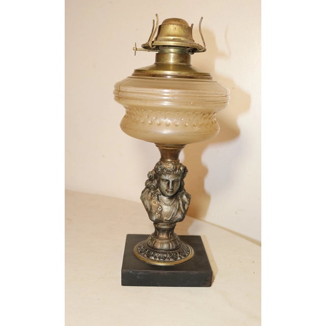 Up for sale is a wonderful antique Victorian figural oil lamp. It can also work as a lovely planter if desired. The...